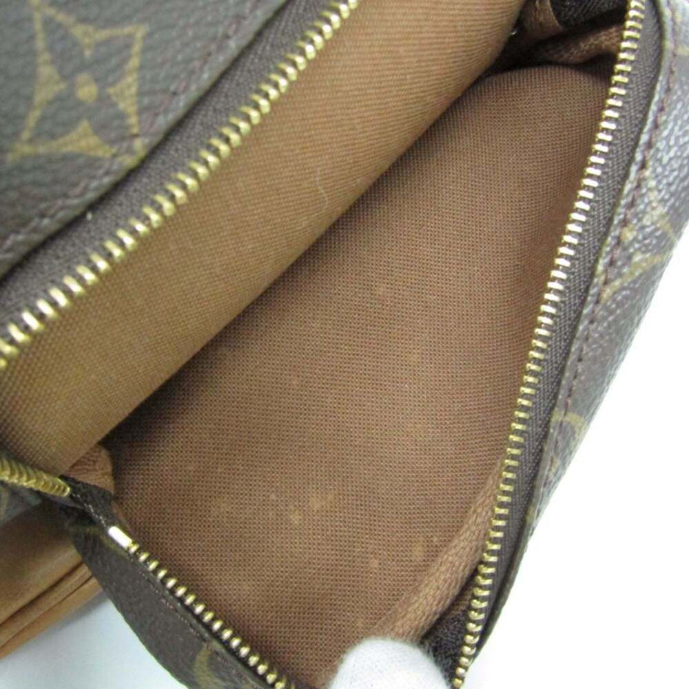 LOUIS VUITTON Brown Monogram Backpack - Picture 7 of 16